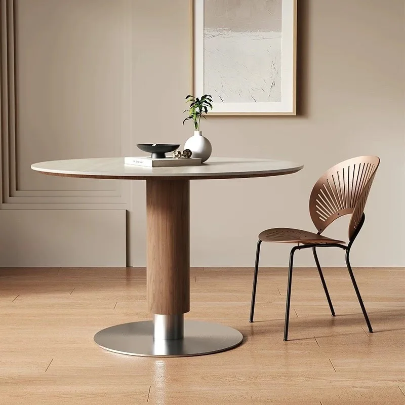 

Medieval travertine rock slab round table household small apartment dining table designer solid wood dining table and chair comb