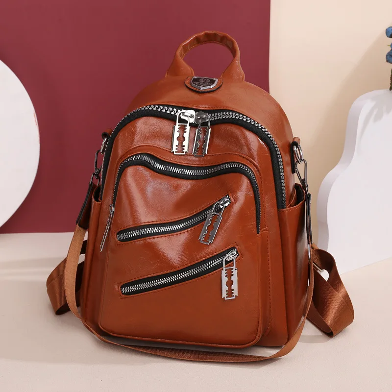 

Europe and the United States new fashion ladies bag soft leather backpack retro backpack simple western-style travel bag.