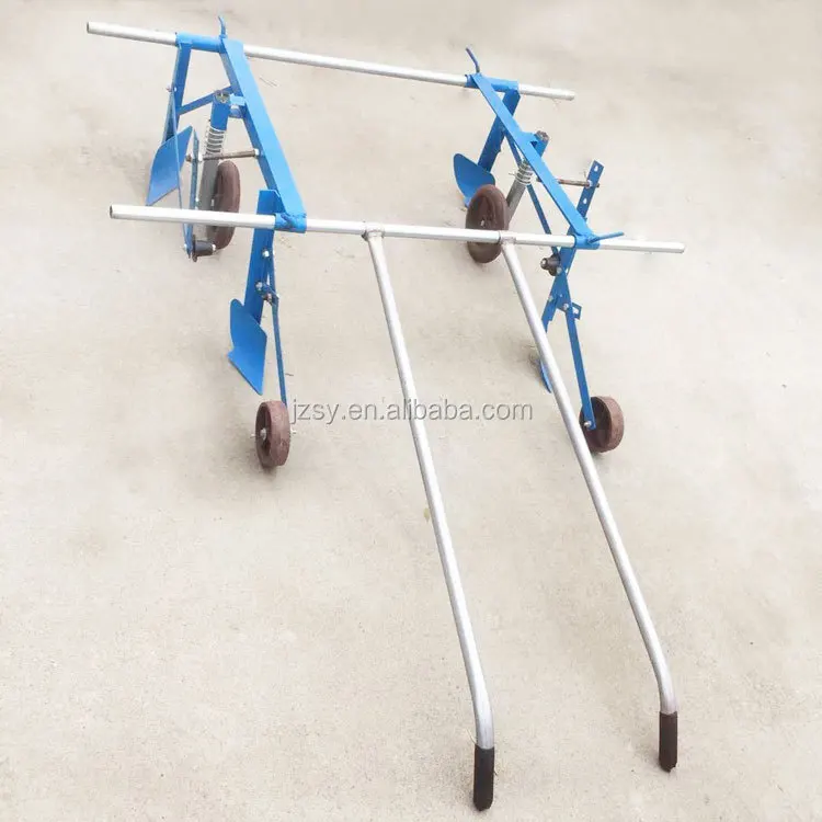 Easy to operate agricultural hand pull plastic film covering laying machine/manual plastic mulch layer mulching Height 20cm 40cm