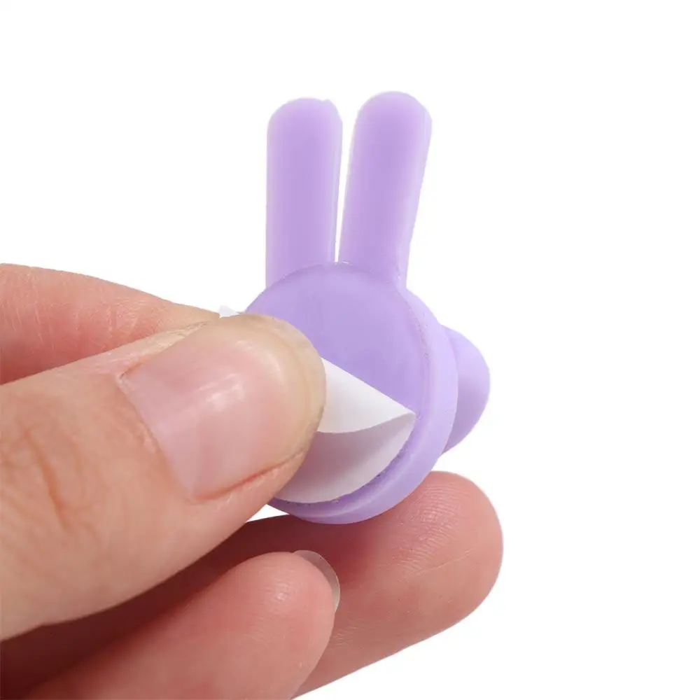 Organizzatore creativo per cavi per pollice in PVC Supporto per cavo multifunzione autoadesivo autoadesivo per pollice