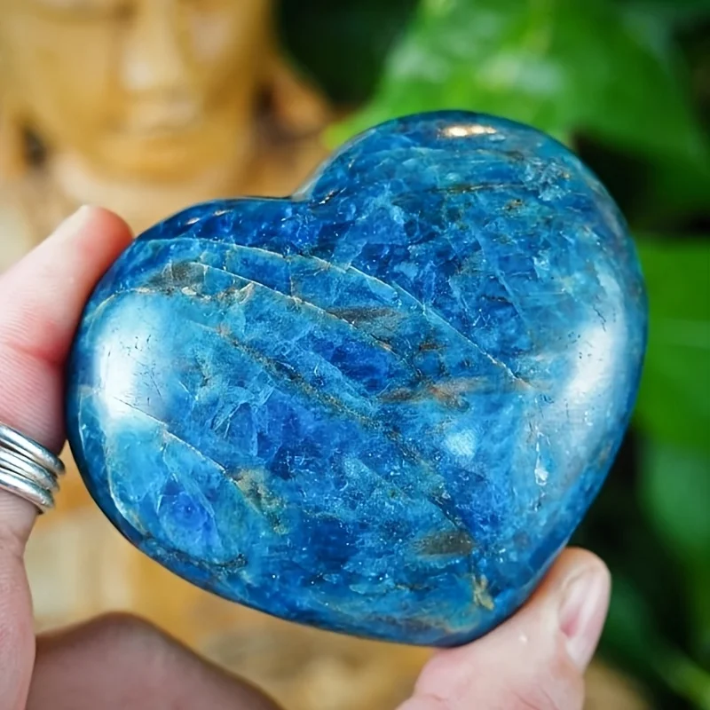 A cute blue apatite heart, a blue apatite heart-shaped palm stone.