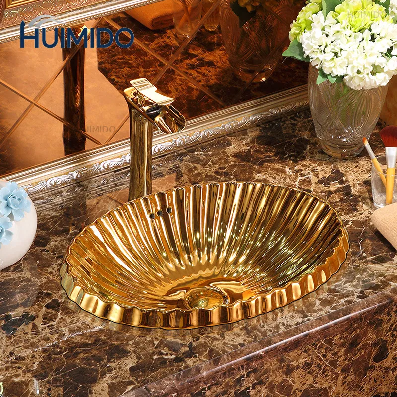 European-style local tyrant gold table basin bathroom creative wash basin oval gold washbasin