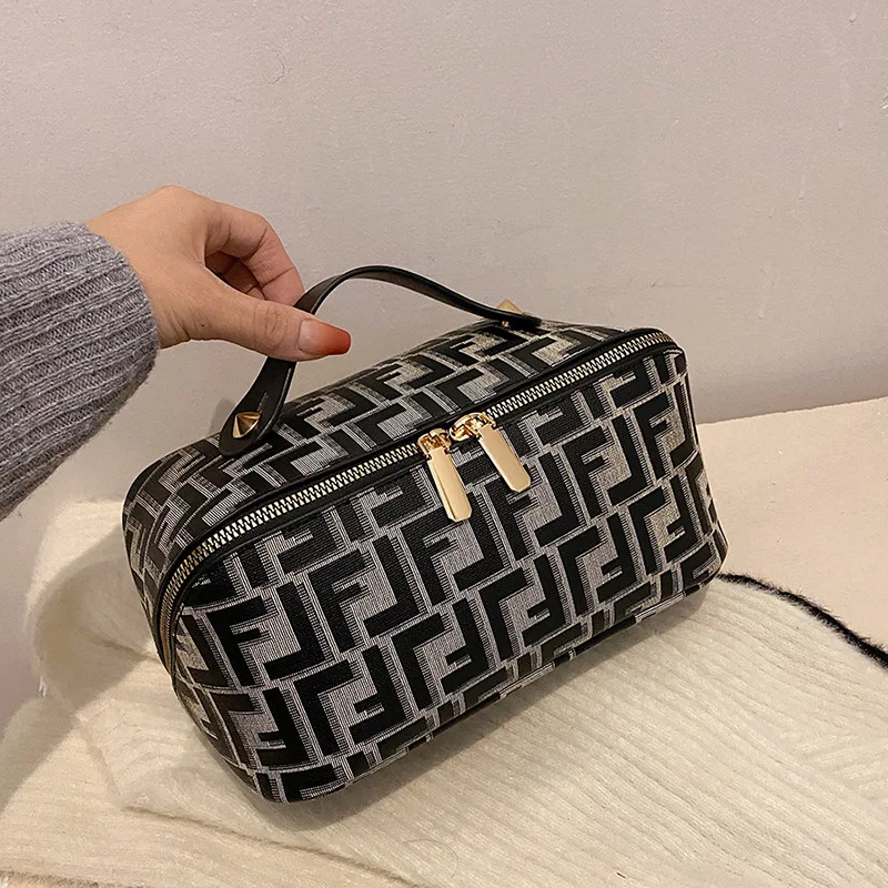 

2026 New Women's Premium Cosmetic & Toiletry Bag, Large Capacity Travel Organizer with Hand Carry, Fashionable Portable Makeup Case for Daily Essentials