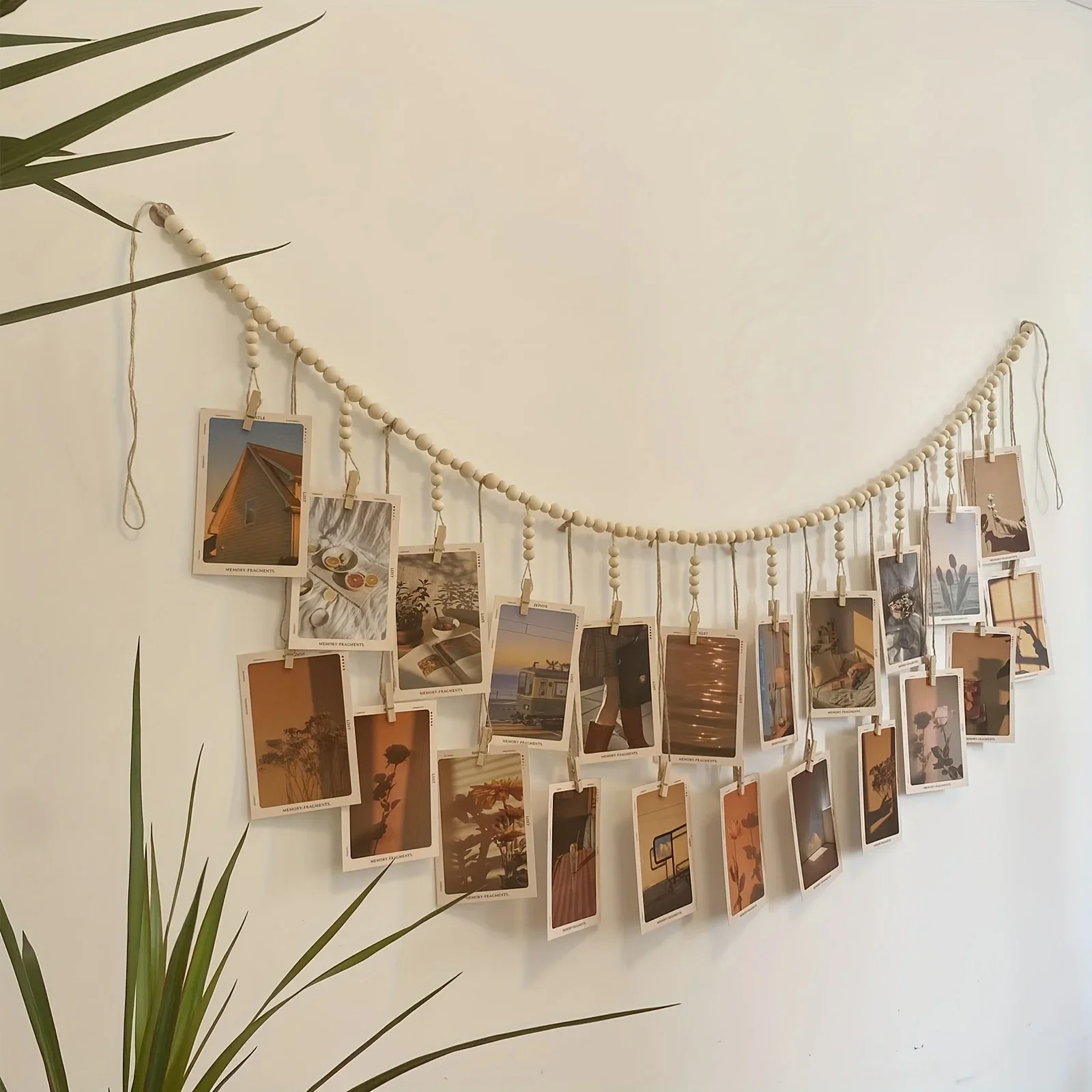 A wall-mounted photo frame decorated with 18 clips and wooden beads - new photo wall, for hanging photos display