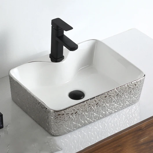 Wholesale Modern ceramic bathroom sink, no faucet hole, no hole above the sink, electroplating design, hotel use, 9 liter
