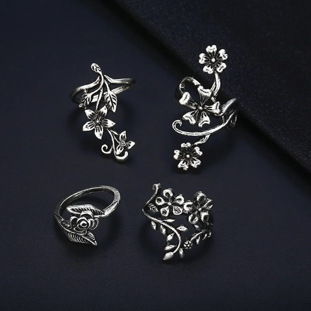 1set Fashionable and Unique Antique Silver Hollow-punched Engraved 4-piece Ring Set
