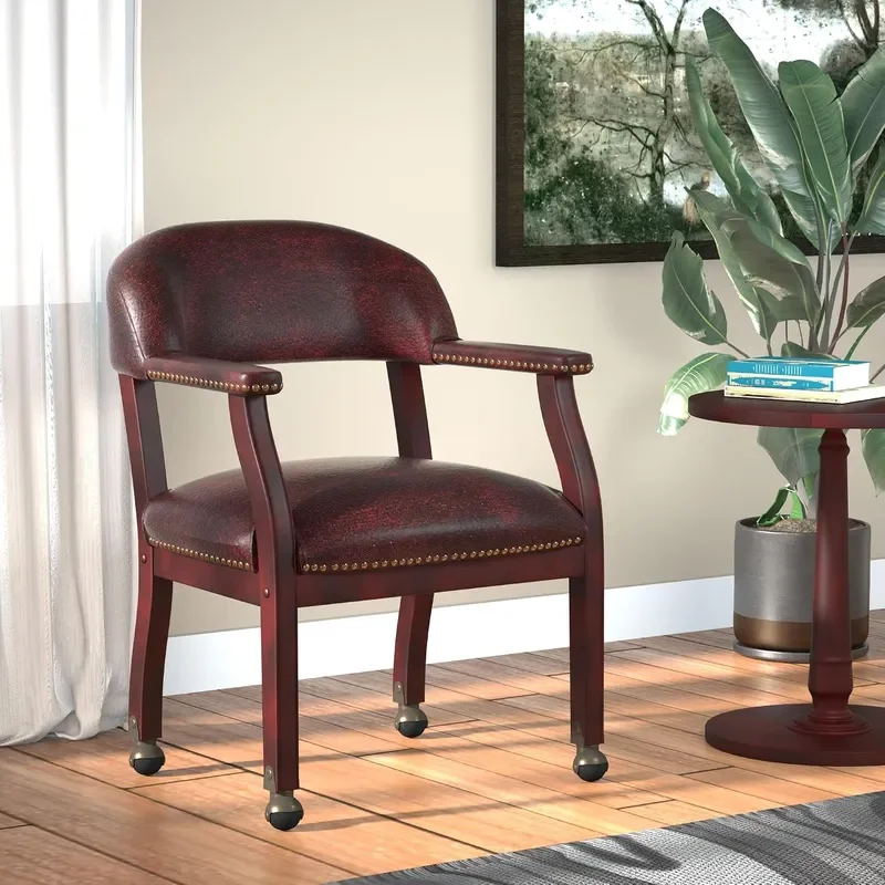 Captain’s Chair In Burgundy Vinyl W/ Casters