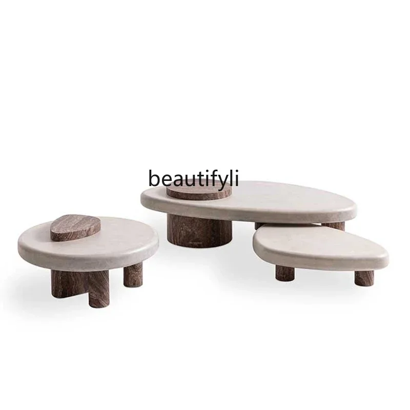 

Light luxury modern wabi-sabi wind travertine coffee table living room home Italian minimalist designer creative coffee table042