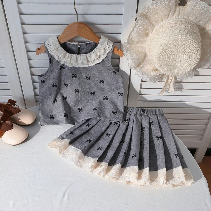 

New Spring-Summer Girls' Lace Ruffle Collar Vest+PleatedATwo-piece skirt set
