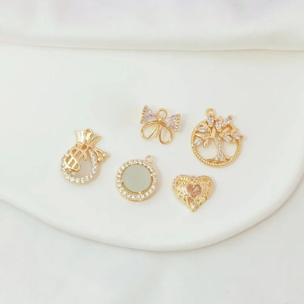 

14K Gold-plated, Slightly Inlaid Zircon Angel Feather, Heart-shaped Life Tree Money Bag, Bow Pendant