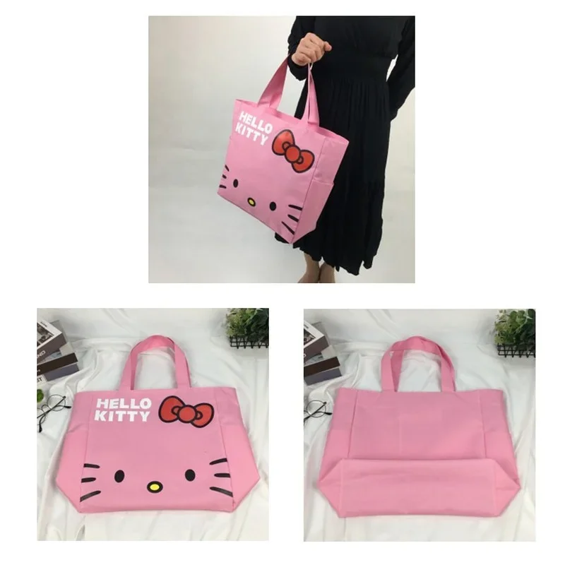 Hello Kitty-monederos y bolsos a la moda, bolsa de lona con dibujos animados, caja de viaje impermeable, Oxford impreso, estuche de compras plegable