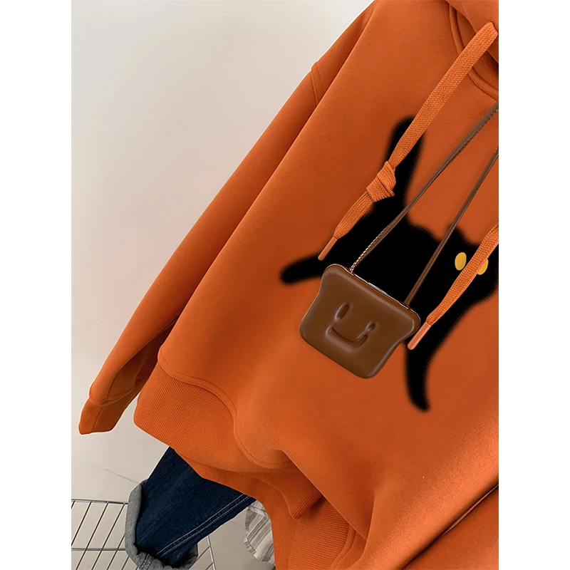 เสื้อฮู้ดดี้สีส้มไซส์ใหญ่สำหรับผู้หญิง ทรงหลวม สวมใส่สบาย เหมาะสำหรับฤดูใบไม้ร่วง ดีไซน์เกาหลี ทรงยาว ไซส์ใหญ่ 300 ปอนด์