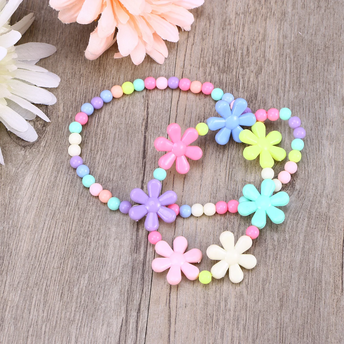 ชุดสร้อยคอและกำไลข้อมือสีลูกกวาดสำหรับเด็กผู้หญิง ลายดอกไม้ เครื่องประดับเรืองแสง ของชำร่วยงานปาร์ตี้ ของขวัญสำหรับเด็ก งานวันเกิด งานแต่งงาน