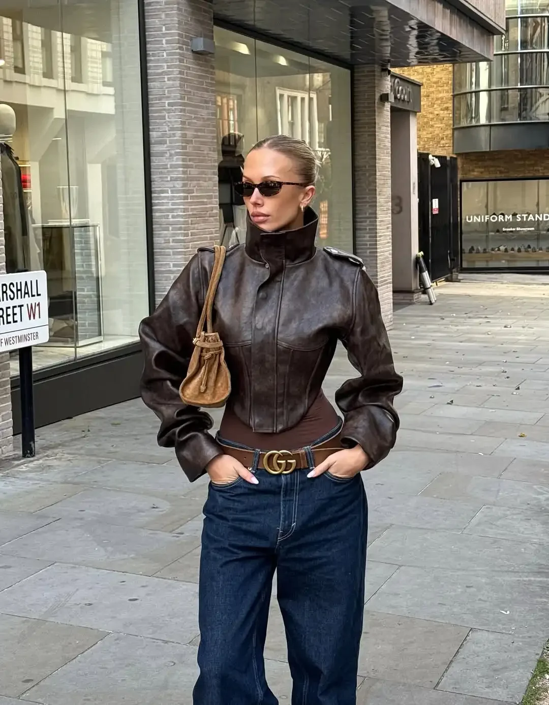 Giacca da donna in pelle con chiusura in vita Moda retrò Colletto alla coreana Manica intera Cerniera Fibbia Giacche corte 2026 Lady Street Outwear