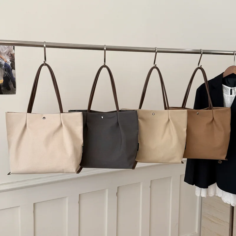 PU leather retro large-capacity hand-held tote bag, simple and waterproof single-shoulder underarm bag for shopping.