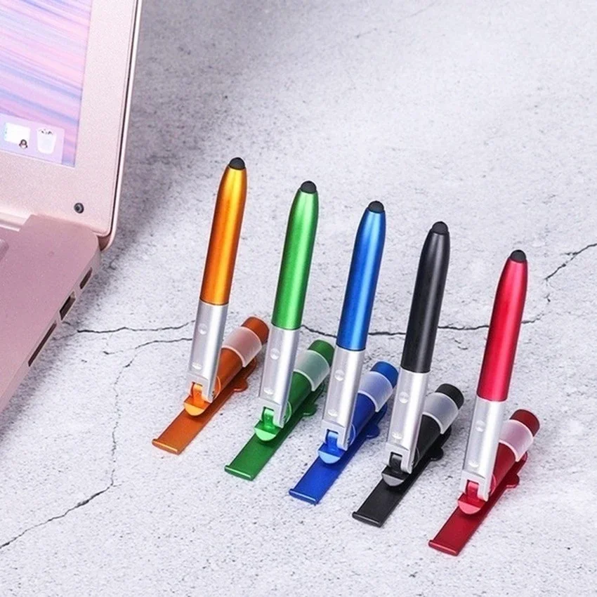 Stylo à bille multifonction avec lumière LED, 4 en 1, possède un support de téléphone, lecture de nuit, crayon d'écriture, bureau, école, étudiant, papeterie