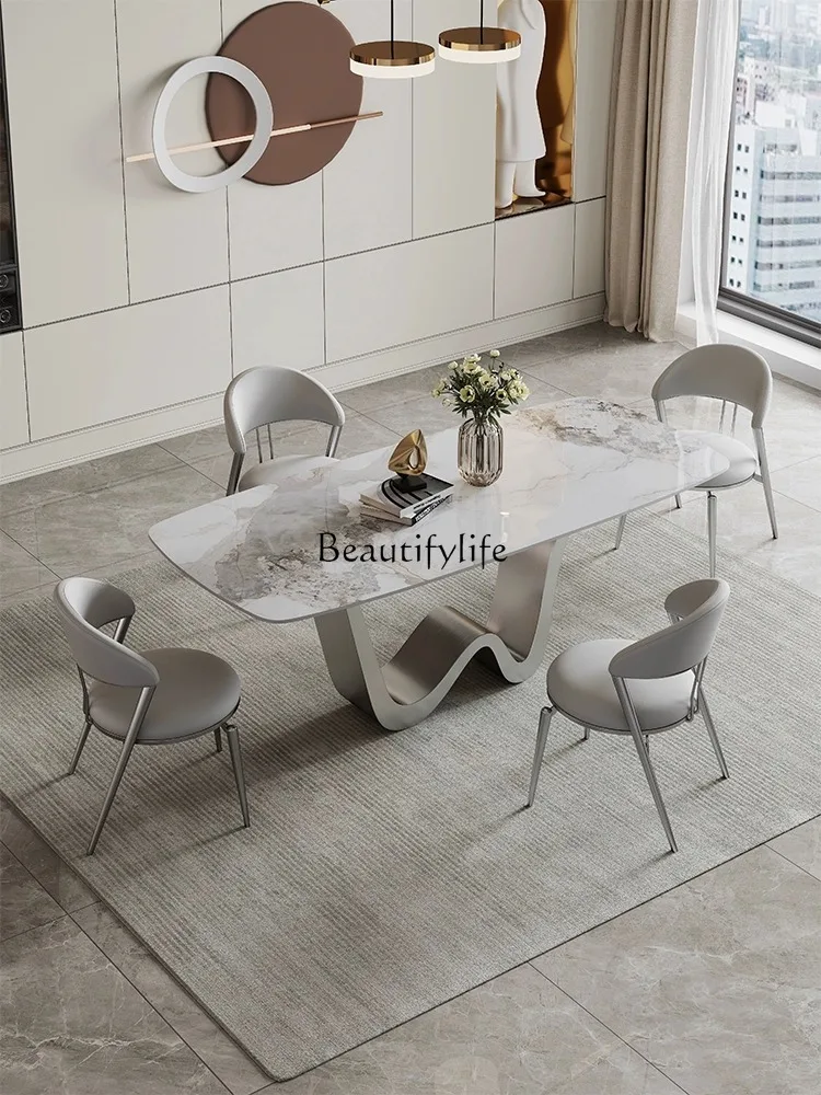 

Household high-end rock slab dining table rectangular Italian minimalist small apartment light luxury dining table