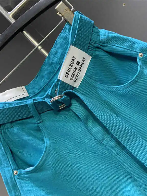 

Летние тонкие джинсовые орты с высокой талией. Женские свободные брюки трапециевидной формы с манжетами. Широкие модные свободные синие джинсы.