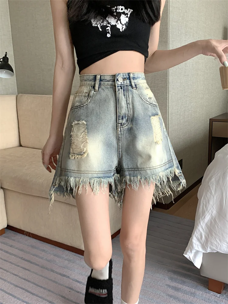 Pantalones vaqueros Retro destridos de cintura alta para mujer, diseño de talla grande con agujero, dobladillo deshilachado, pantalones picantes de cintura alta para primavera y verano