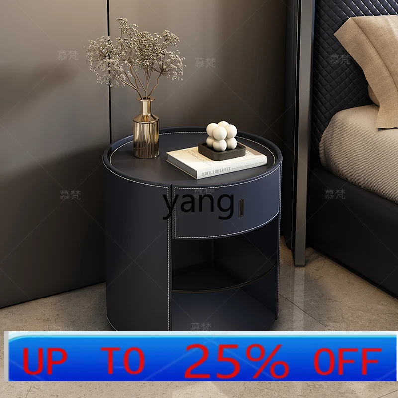 

Lmm saddle leather rock slab bedside table bedroom round leather art high-end bedside table