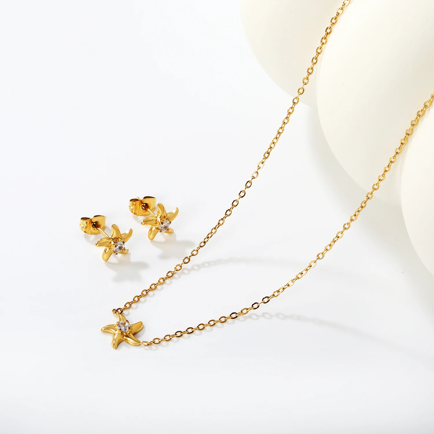 Modisches Edelstahl-Schmuckset mit Blumen- und Seestern-Zirkonia für Mädchen, Einfache Alltags-Halskette und Ohrringe