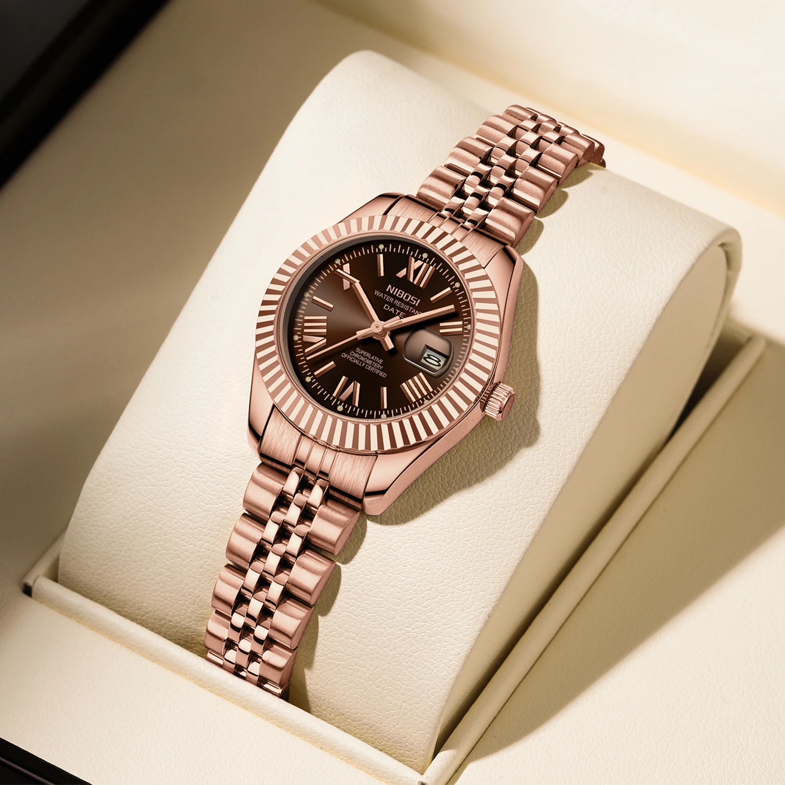 ساعة NIBOSI النسائية التناظرية كوارتز مقاومة للماء للسيدات مع تاريخ أنيق ذهبي أنيق فاخر من الفولاذ المقاوم للصدأ