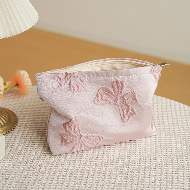 Pink bow women\'s makeup bag, large capacity cosmetics, sanitary napkin storage bag, portable travel toiletry bag commuter clutch