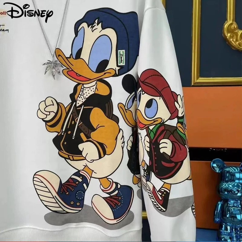 Disney 2022 New Arrival Fashion Autumn Cotton Loose O-neck Ins Couple Casual Cartoon Donald Duck Print Long Sleeve Sweatshirt