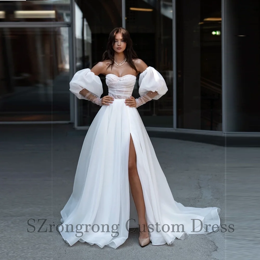 

Sweetheart Collar Beaded Pearls A-line Boho Wedding Dress Puff Sleeve Backless Side Slit Bridal Dress with Train Customized