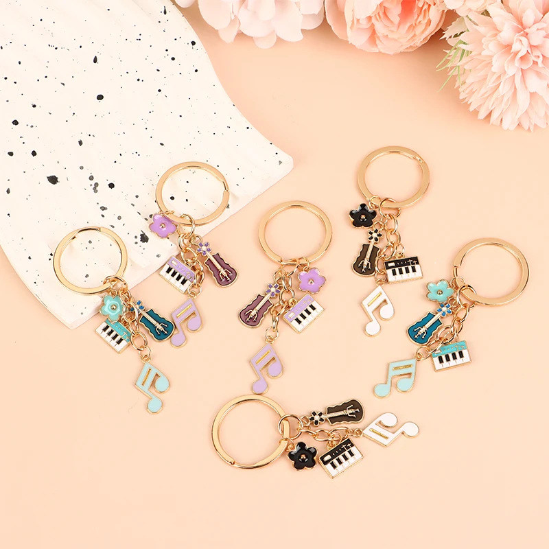 

Cute Enamel Mini Musical Instruments Keychain Piano Guitar Keyring Pendants For Women Girls Handbag Decoration DIY Jewelry Gift