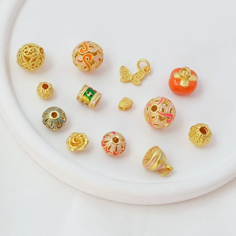 

Copper alloy plated with sand-gold, hollowed-out persimmon, auspicious cloud, rose, butterfly pendant, diy handmade accessory