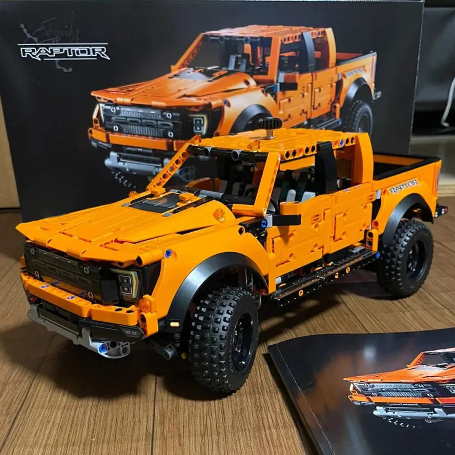 

Новинка! Конструктор Disney Ford Raptor F-150: Гоночный пикап (модель 42126), 1379 деталей. Игрушка-модель автомобиля для детей, отличный подарок.