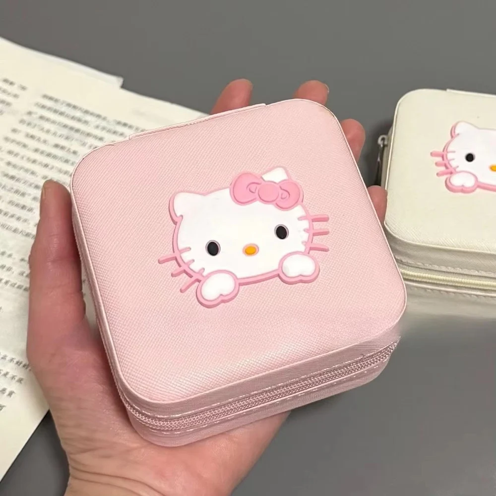 กล่องใส่เครื่องประดับแมวน่ารักสีชมพู Sanrio รุ่นใหม่ ขายดี พกพาสะดวก กล่องเก็บแหวน ต่างหู กล่องเก็บอุปกรณ์เสริมขนาดเล็กพกพาสำหรับเดินทาง