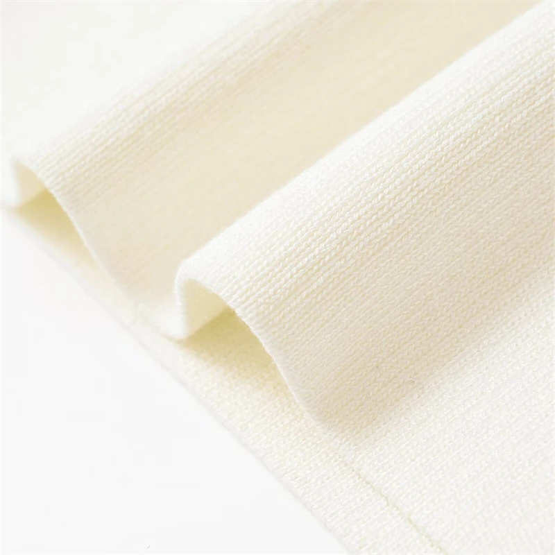 KEYANKETIAN letnia nowa damska złota ozdoba na guziki kamizelka z dzianiny styl rekreacyjny O-Neck sweter bez rękawów Camisole krótki top