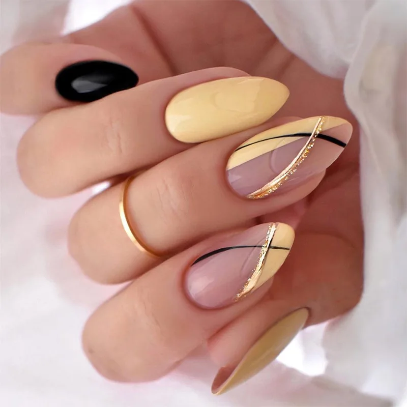 24 szt. Sztuczne paznokcie migdałki, żółte francuskie tipsy z błyszczącymi proszkowymi liśćmi, krótkie okrągłe paznokcie do wciskania wielokrotnego użytku