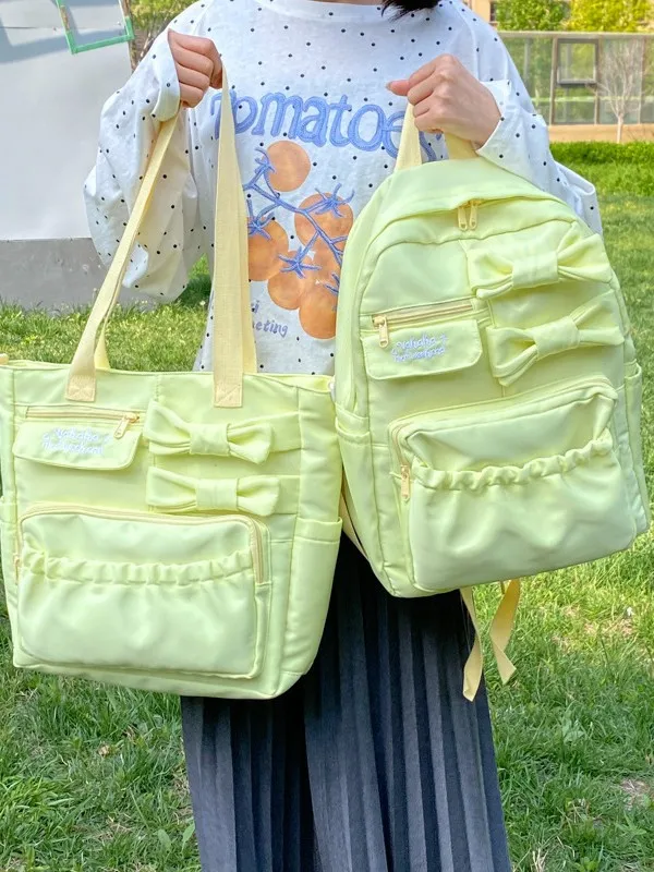 Women's Backpack Cherry Blossom Milk Mist Fluttering Butterfly Bow Backpack Korean Girl Student Party Versatile Campus Commuting