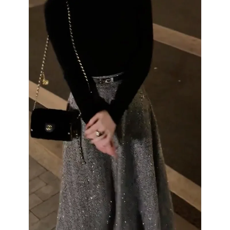 Hoog getailleerde gemarkeerde zak bedrukte verticale rechte wollen rok voor dames herfst en winter nieuwe losse afslankende zoomrok