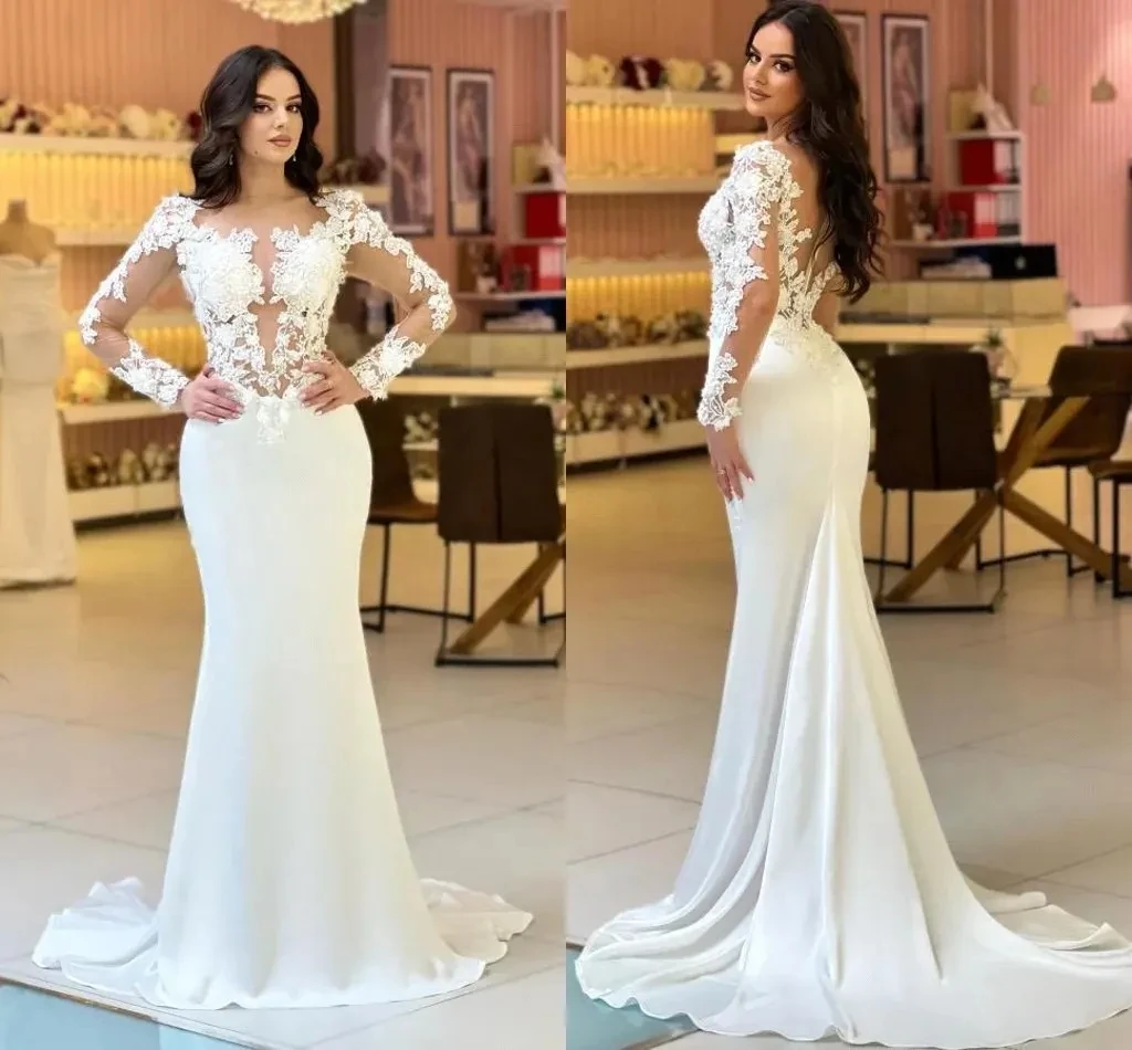 Hot selling luxury sexy white mermaid lace transparent long sleeve decal wedding dress beach backless bridal dress custom 2025