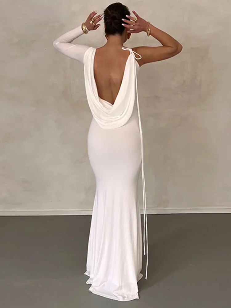 Girl With Back Pose: How This Backless Maxi Dress Transformed My Evening  Look Without Compromising Comfort or Confidence
