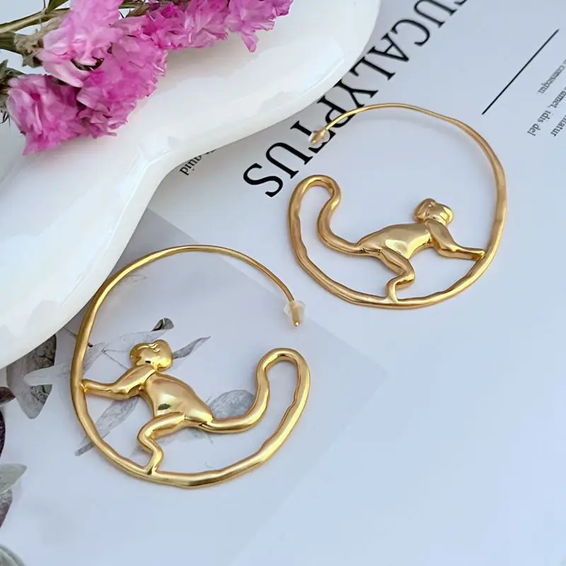 

Temperament, fun, long tailed monkey style, niche design, women's metal earrings