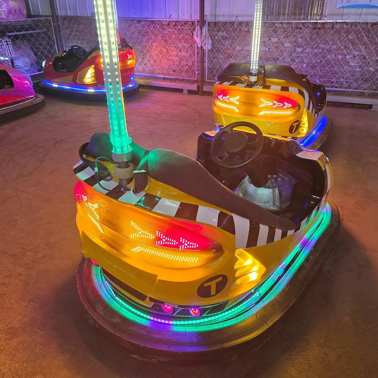

Indoor/Outdoor Amusement Park & Mall Kids/Adults Ride LED Light-Up NYC Taxi Bumper Cars