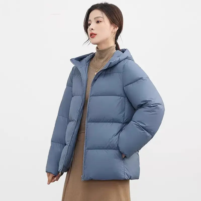 Down jacket women's new winter 2024 fashionable temperament simple thickened short age-reducing bread jacket cocoon jacket