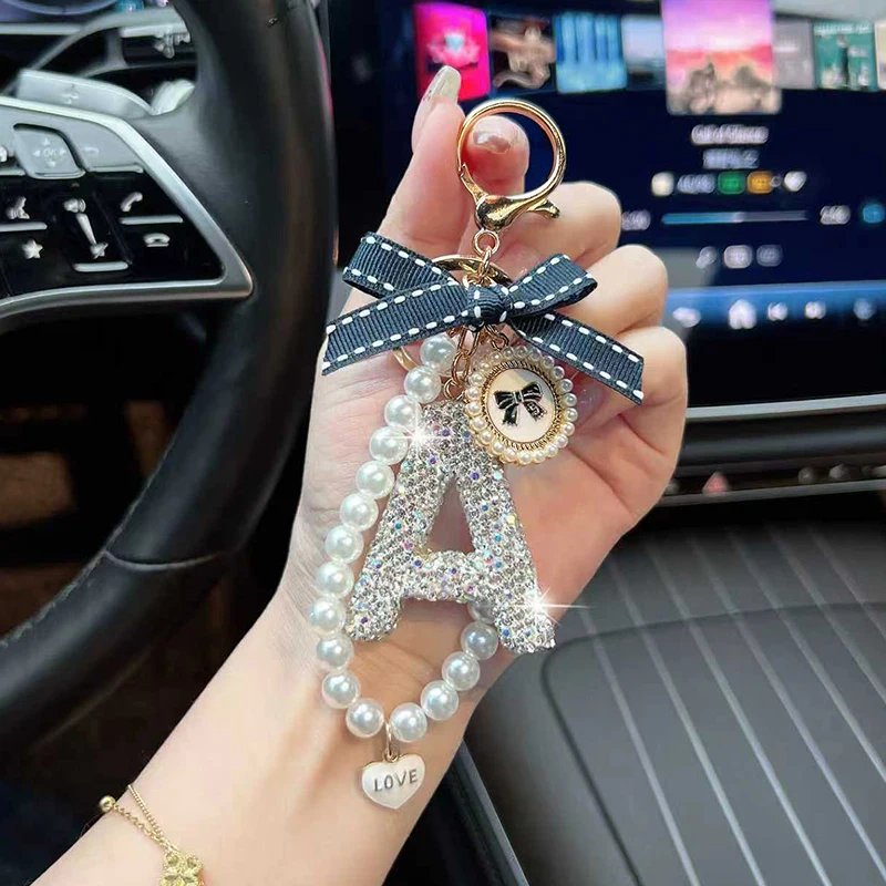 Fashion Bow Letter Keychain Creative Exquisite Pearl Chain English Car Keychain Ring Women's Bag Pendant Decoration Gift
