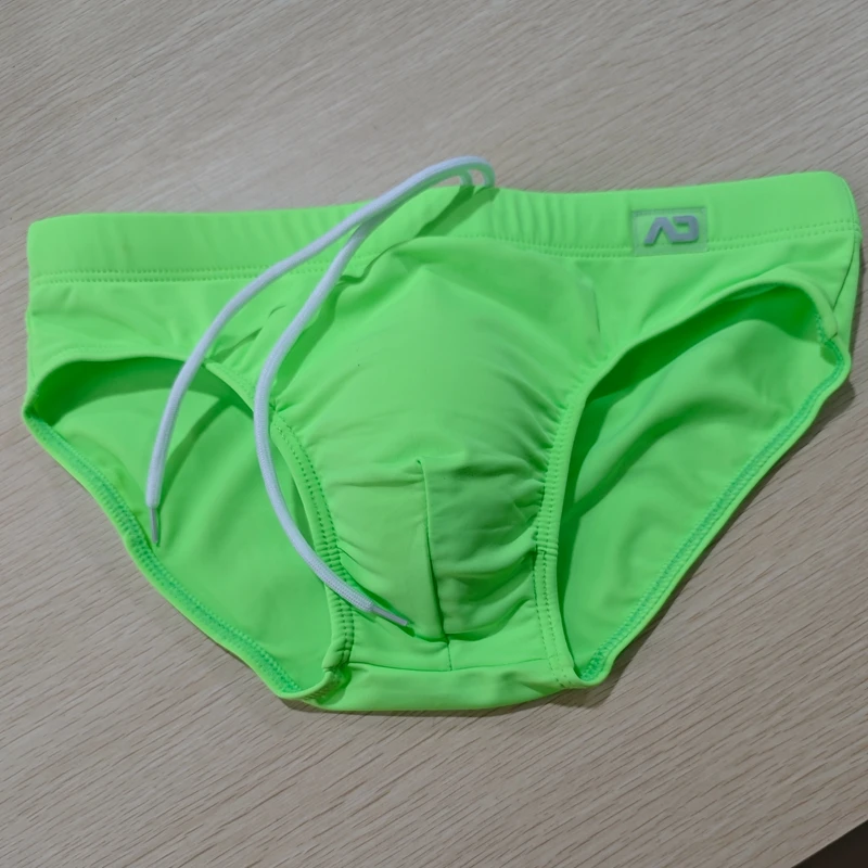 Real shot  trunks men's low-rise briefs solid color nylon swimming trunks cup anti-embarrassment beach pants tether BS420