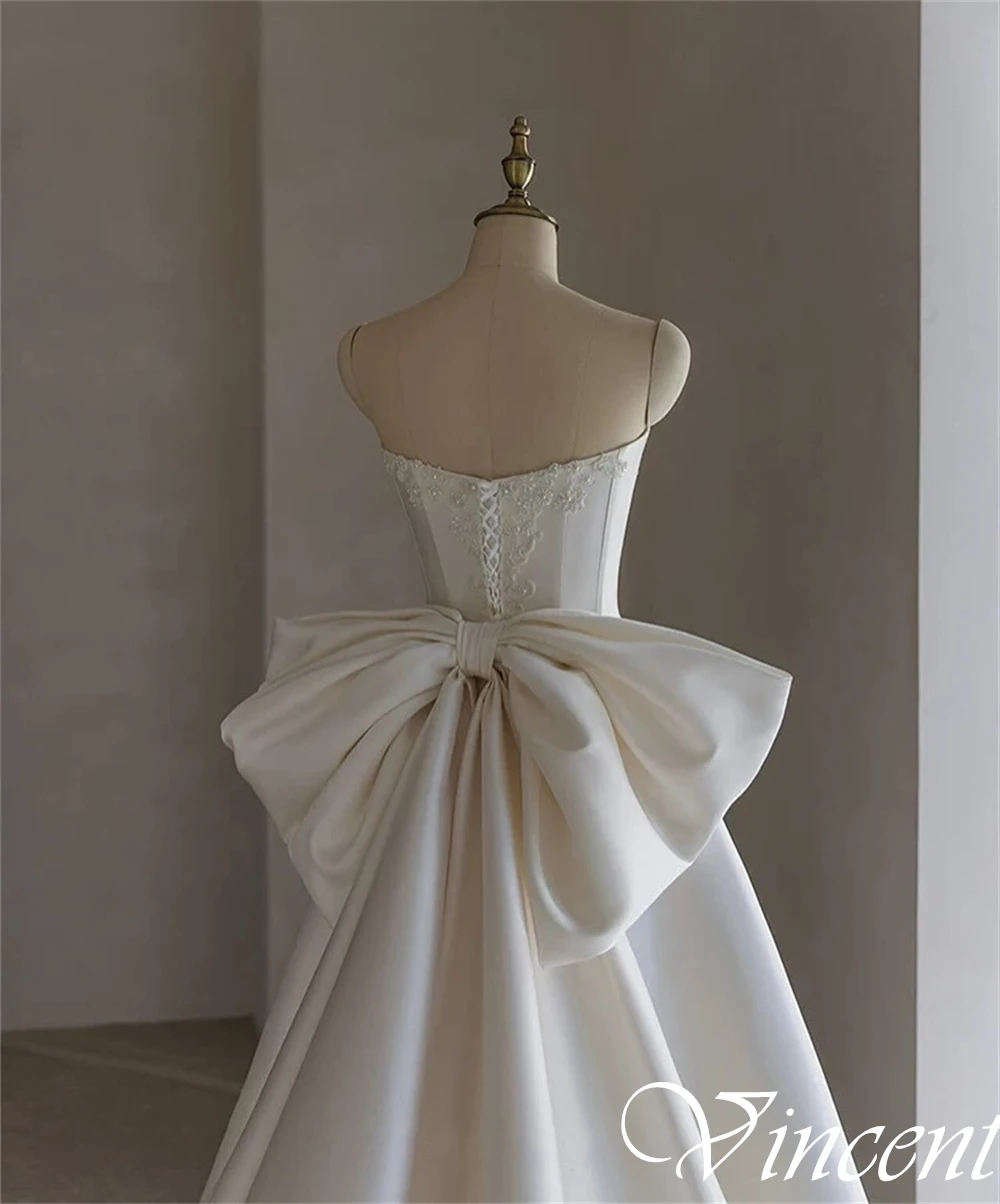 فساتين زفاف عصرية مخصصة بدون حمالات من الساتان بدون أكمام على شكل حرف a فستان زفاف كلاسيكي بفيونكة كريستال عالية الجودة رداء de mariée