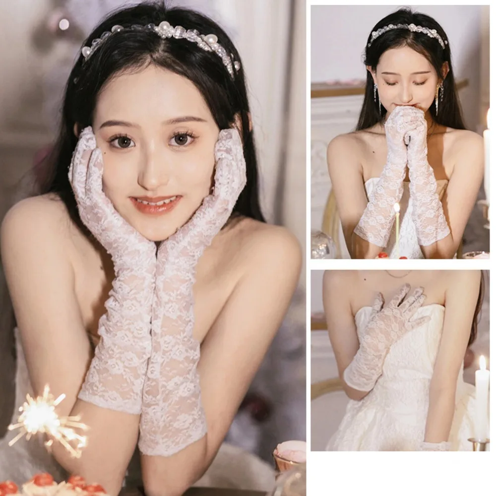 ถุงมือยาวผ้าซาตินสีขาวแฟชั่น ถุงมือแต่งงานลูกไม้สไตล์วินเทจ ถุงมือยาวนิ้วยาวยืดหยุ่นหวานๆ สำหรับสุภาพสตรี