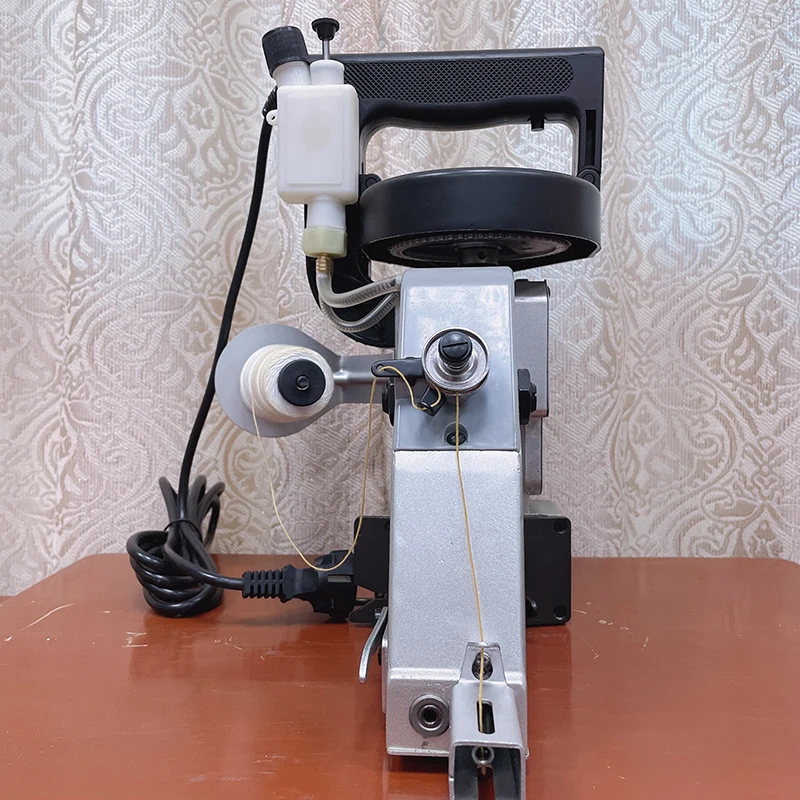 ماكينة ختم الأكياس الكهربائية المحمولة GK26-1A/GK26-2A، ماكينة خياطة صغيرة للاستخدام المنزلي/التجاري، المصنع الصيني مباشرة