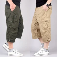 Pantalones cortos Cargo de longitud larga para hombre, pantalones Capri elásticos de algodón informales con múltiples bolsillos, pantalones cortos tácticos militares para hombre 5XL