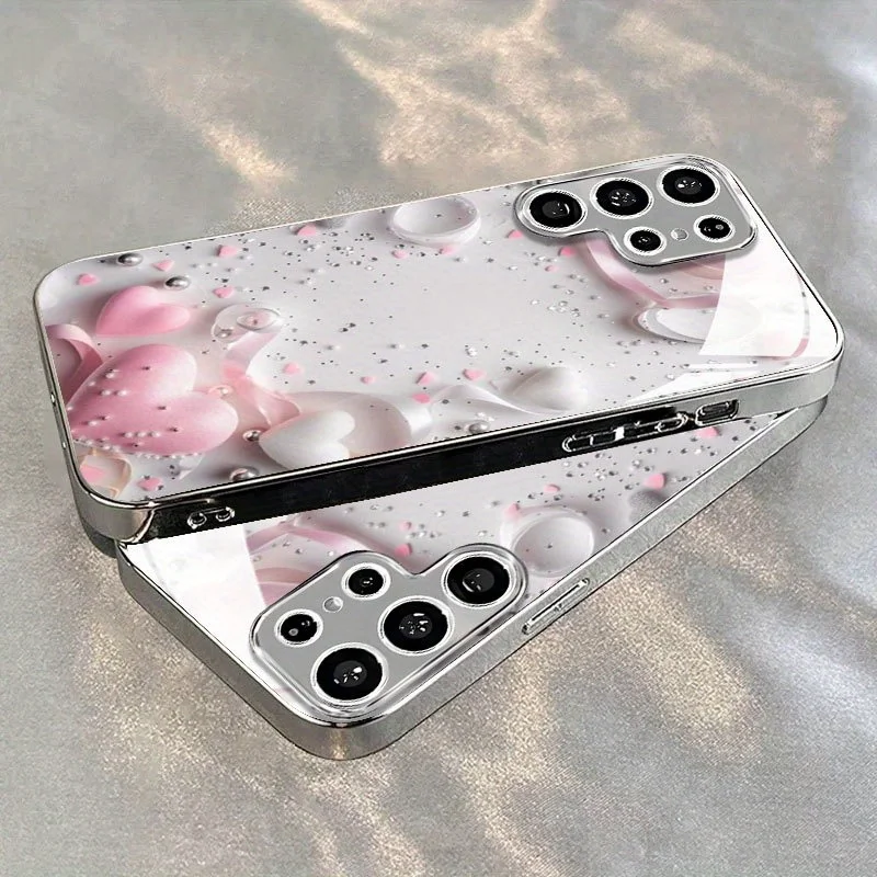 Heart-shaped pattern electroplated glass phone case,, suitable for Samsung S26/S25/S24/S23/S22/S21/S20 and other models.