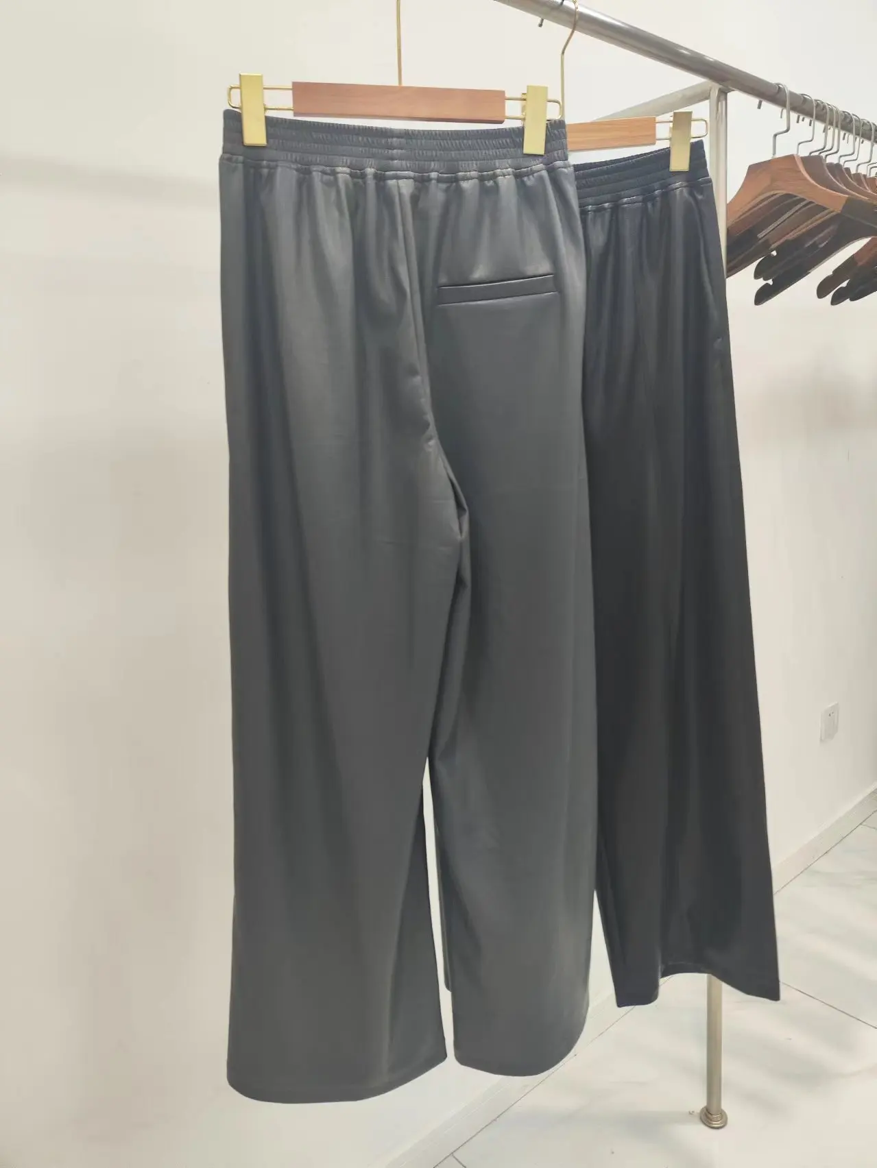 Fenggejiwo women's PU pants elastic waist solid color leather pants wide leg pants